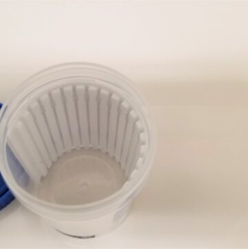 healthcare-and-medicine-taking-a-urine-sample-filling-a-sterile-urine-specimen-cup-for-pain_t20_Jz2r2Q