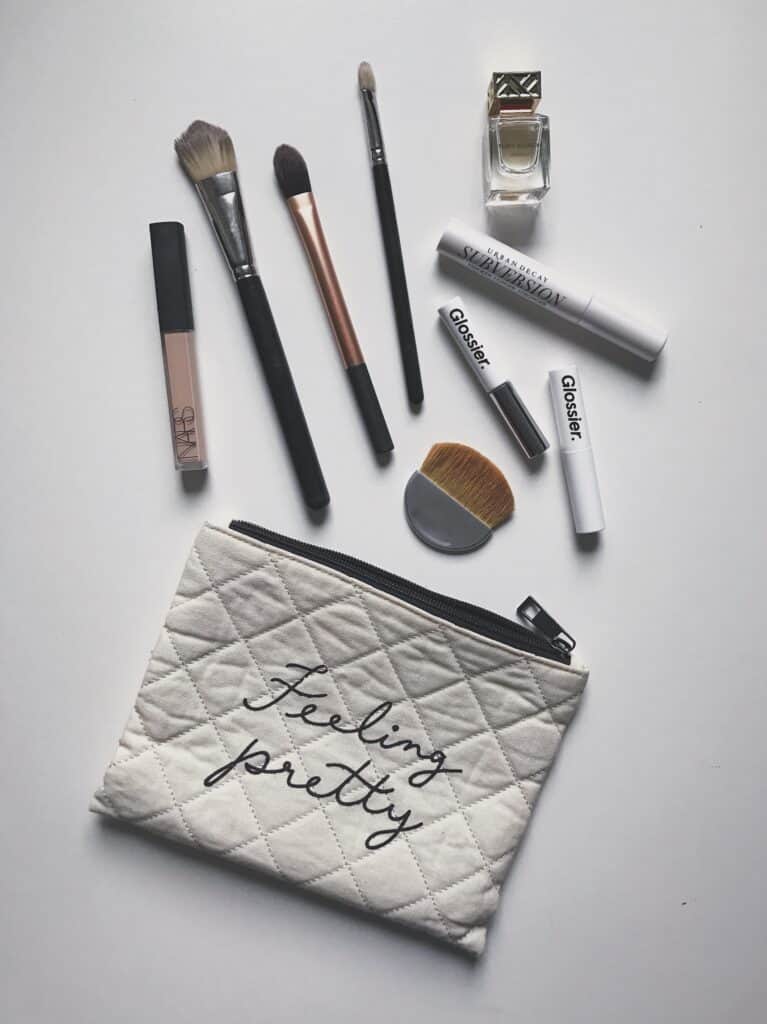 these-are-a-few-of-my-favorite-things-beauty-products-in-a-pretty-little-quilted-makeup-bag