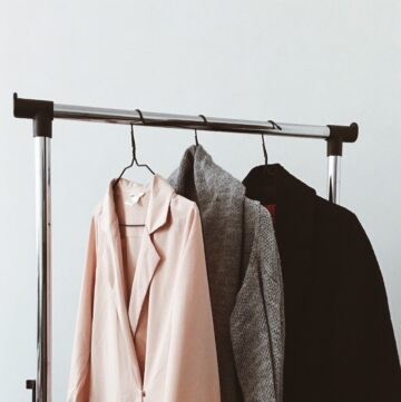 clothes on rail minimalist style wardrobe